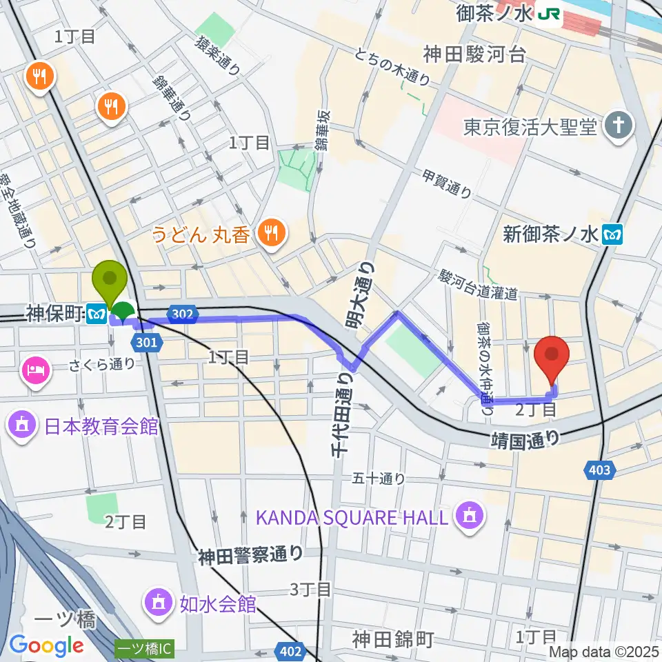 神保町駅からウッドマンお茶の水店へのルートマップ地図