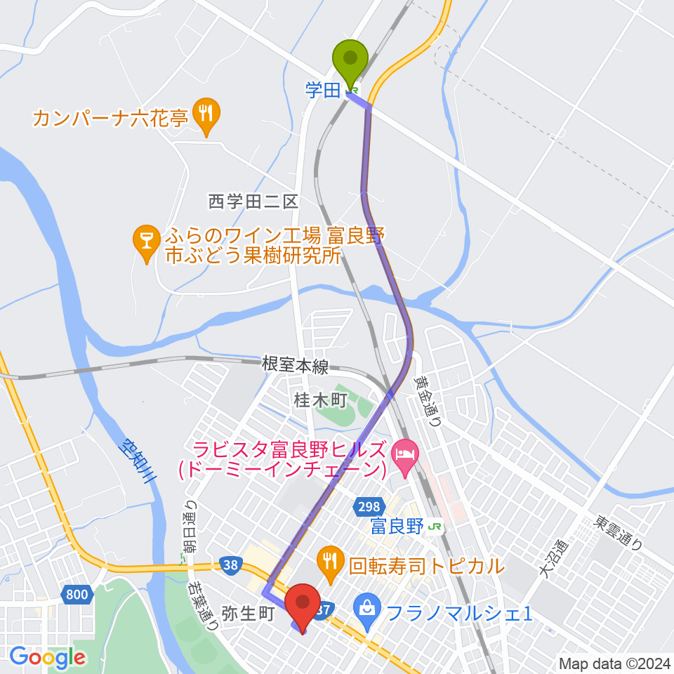 学田駅から富良野文化会館サンエーホールへのルートマップ地図