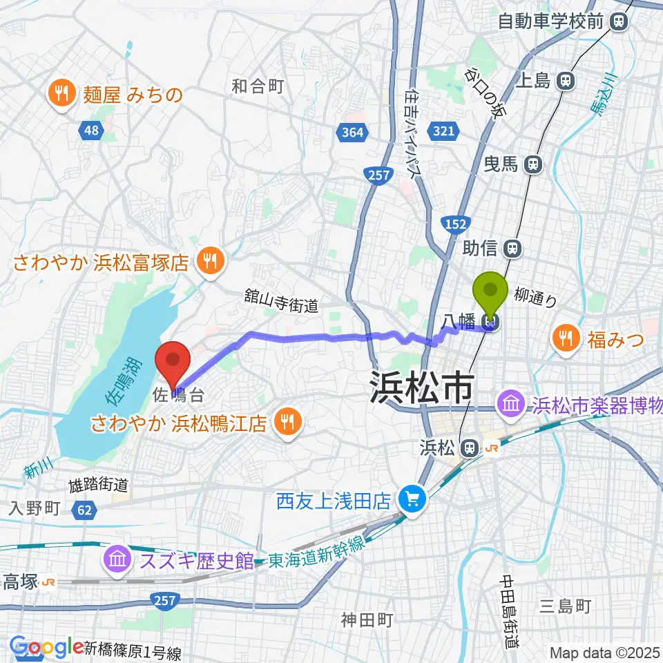 八幡駅から足立楽器店へのルートマップ地図
