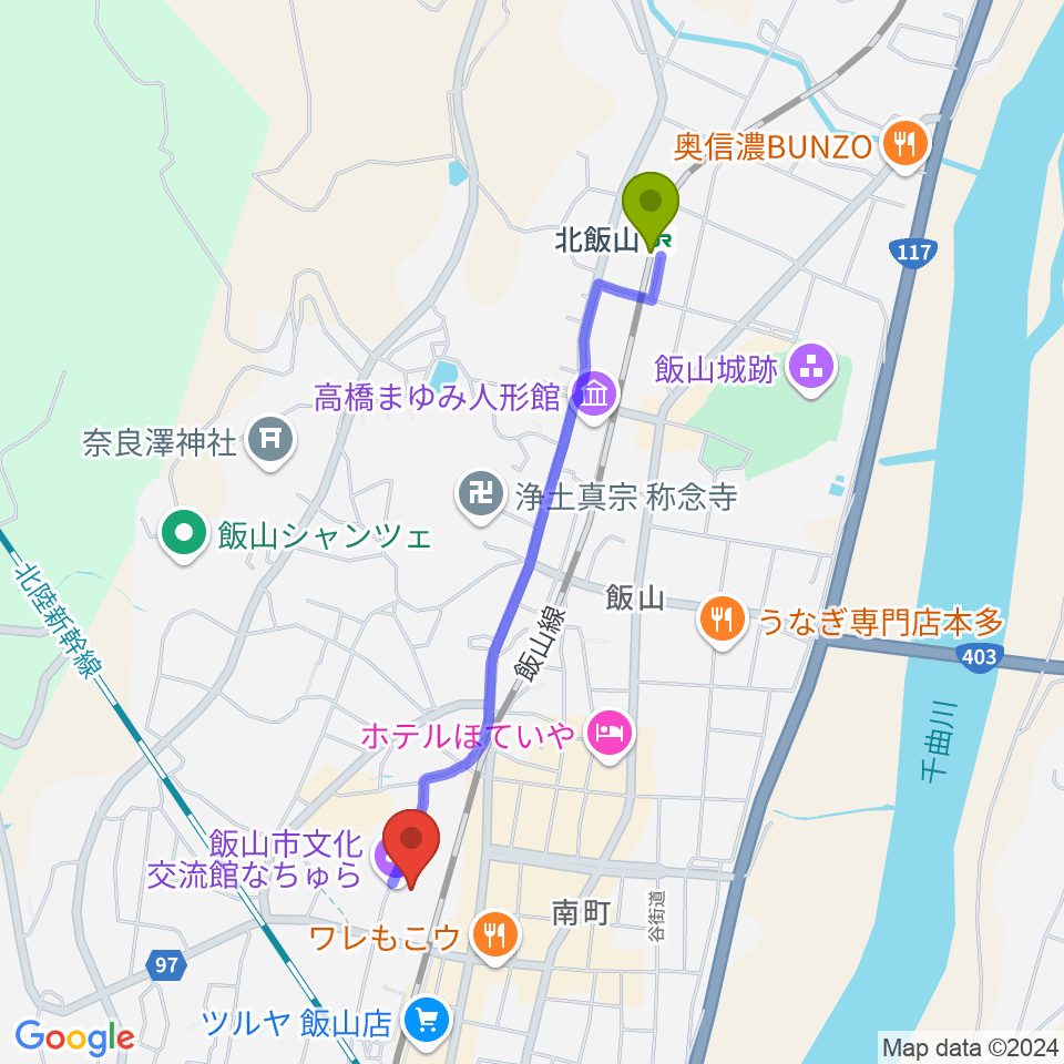 北飯山駅から飯山市文化交流館なちゅらへのルートマップ地図