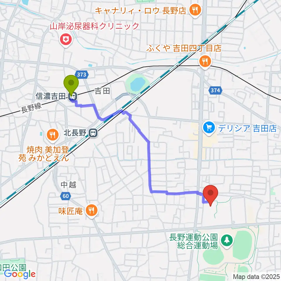 信濃吉田駅から長野運動公園総合体育館へのルートマップ地図