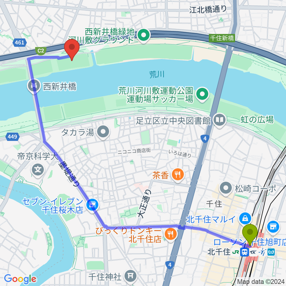 北千住駅から西新井橋緑地球技場へのルートマップ地図