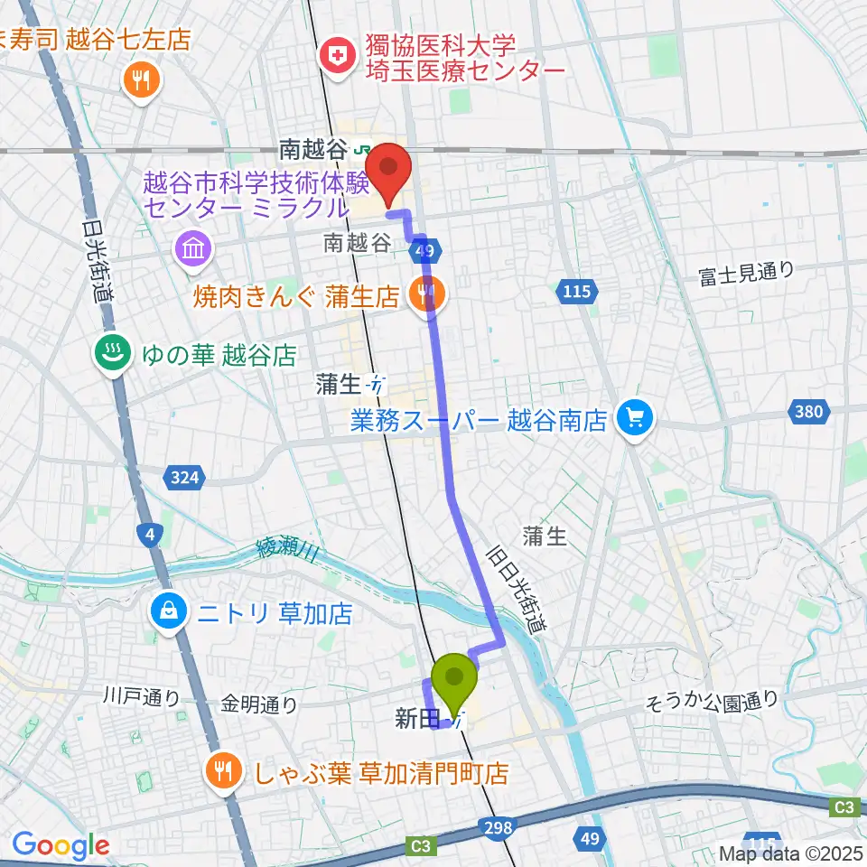 新田駅から越谷サンシティホールへのルートマップ地図